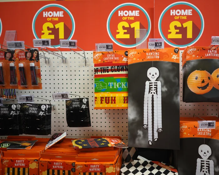 Exterior view of a Poundland discount storefront on a British high street