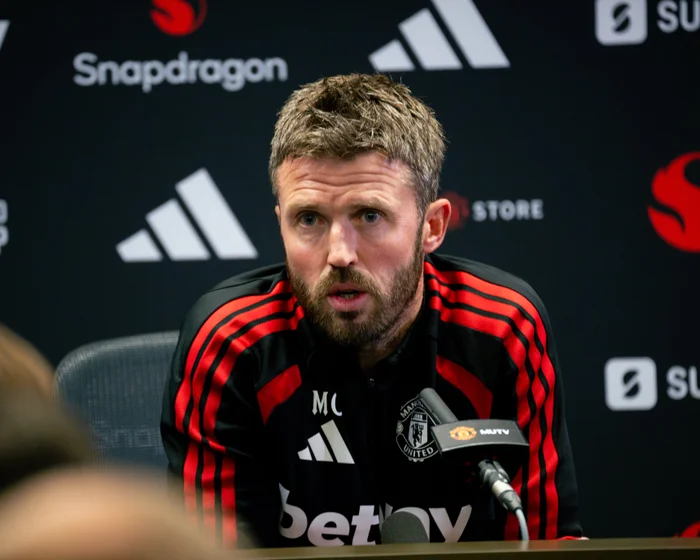 Manchester United head coach Michael Carrick speaking during a press conference at Carrington.