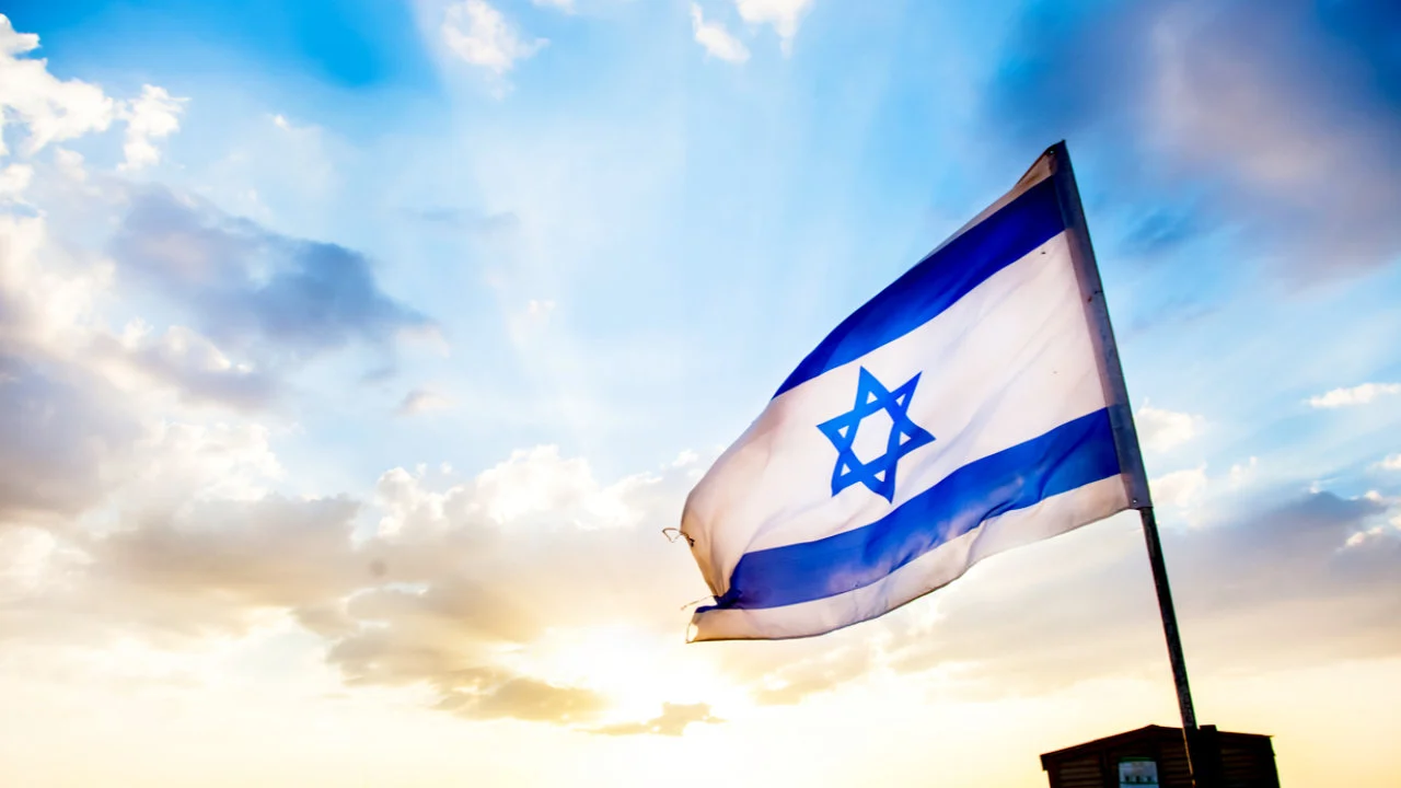 Israeli Prime Minister Benjamin Netanyahu speaking during a broadcast interview about national economic policy.