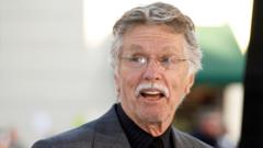 Actor Tom Skerritt smiling at an industry event.