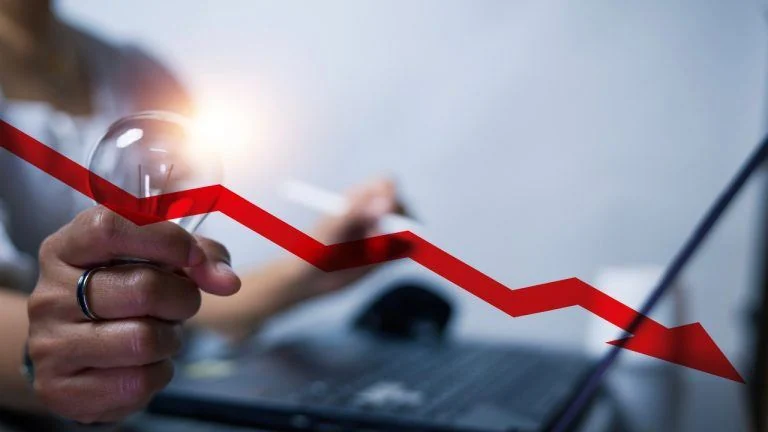 Abstract digital rendering of declining financial charts alongside glowing decentralized blockchain network nodes