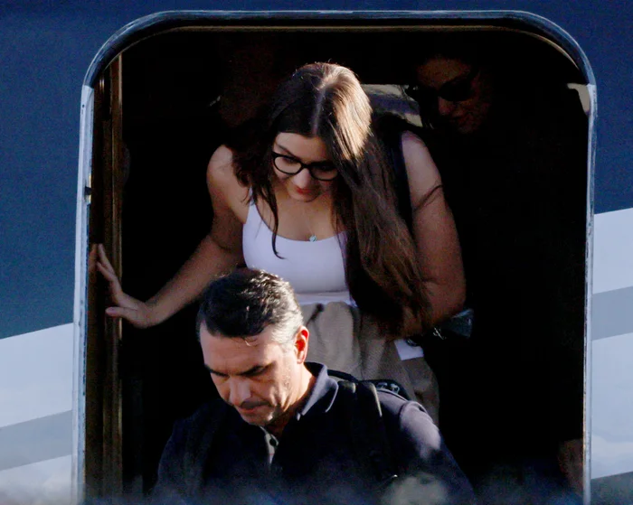 Flávio Bolsonaro disembarks from an aircraft near Miami.