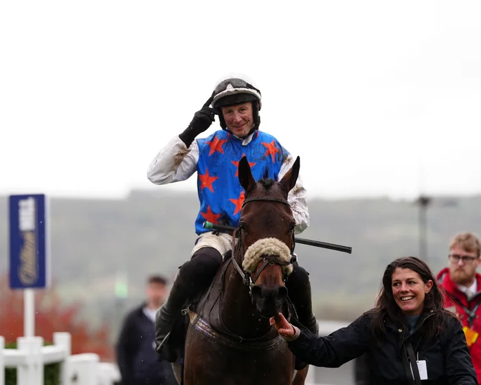 Kingofthefrontier clearing a hurdle on his way to victory at Cheltenham