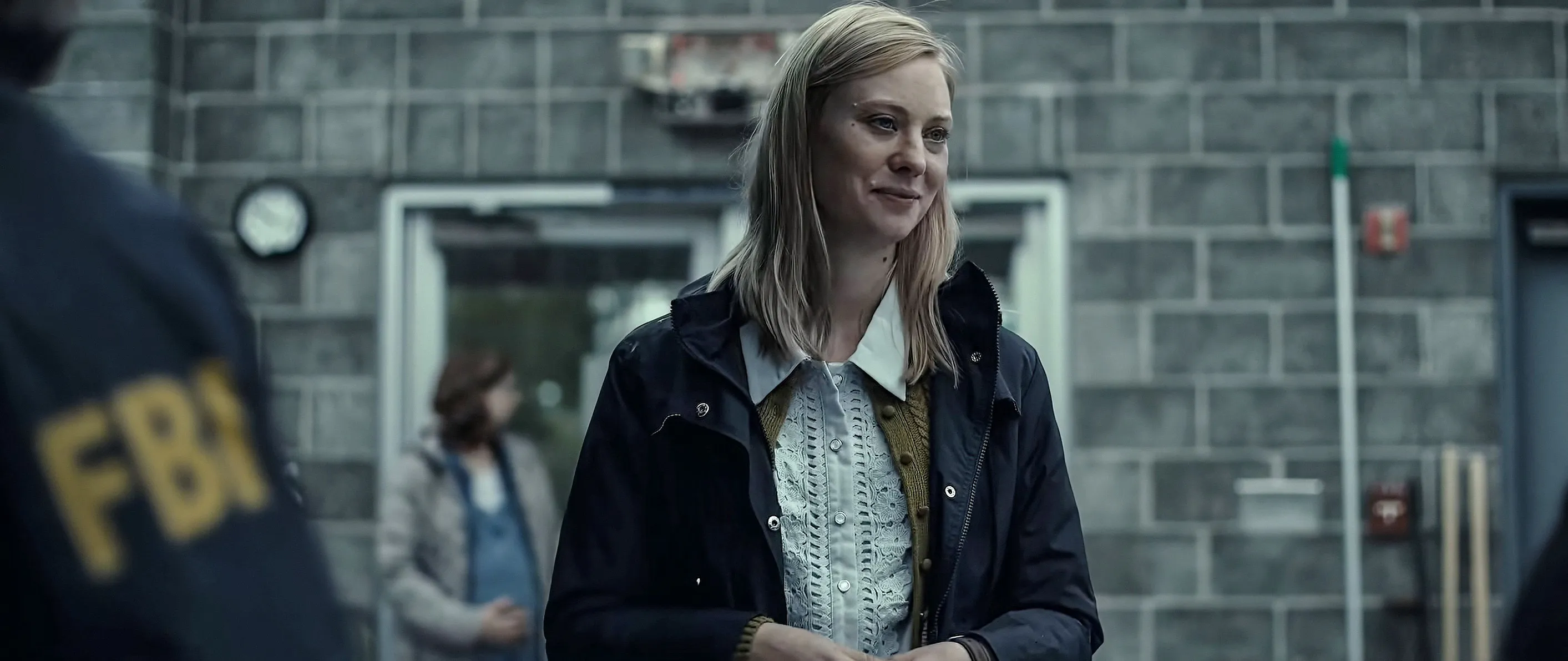 Deborah Ann Woll and Jeffrey Donovan investigate a forensic crime scene in Shudder's horror film The Cycle.