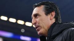 Aston Villa manager Unai Emery gesturing from the touchline during a Premier League fixture.