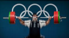 Weightlifting barbell and plates on a competition platform
