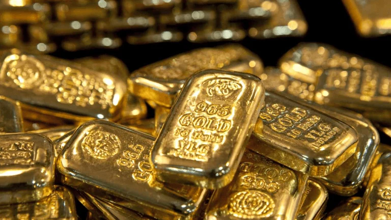 Gold bullion bars illustrating a report on gold’s role as a market hedge