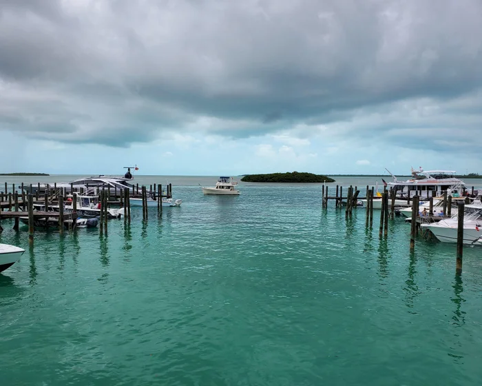 Boats moored at a marina in North Bimini, Bahamas