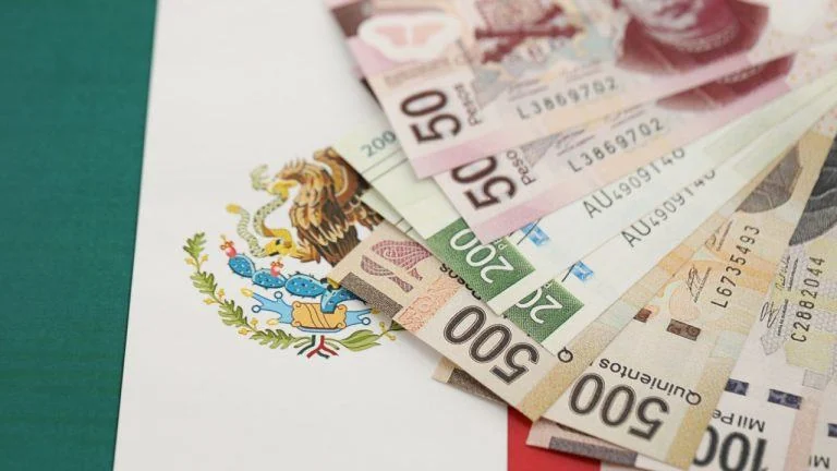 Illustration of dollar and Mexican peso stablecoins connected across blockchain networks