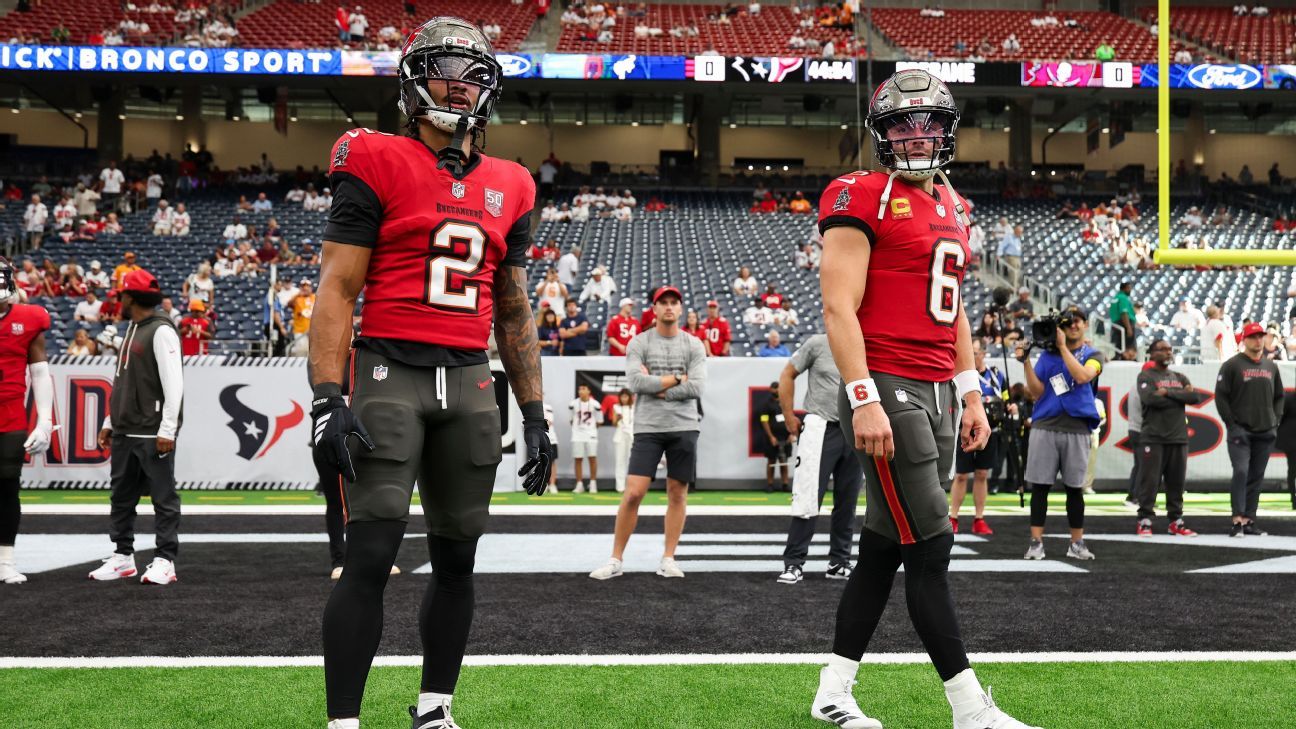 Tampa Bay Buccaneers quarterback Baker Mayfield in uniform on the field.