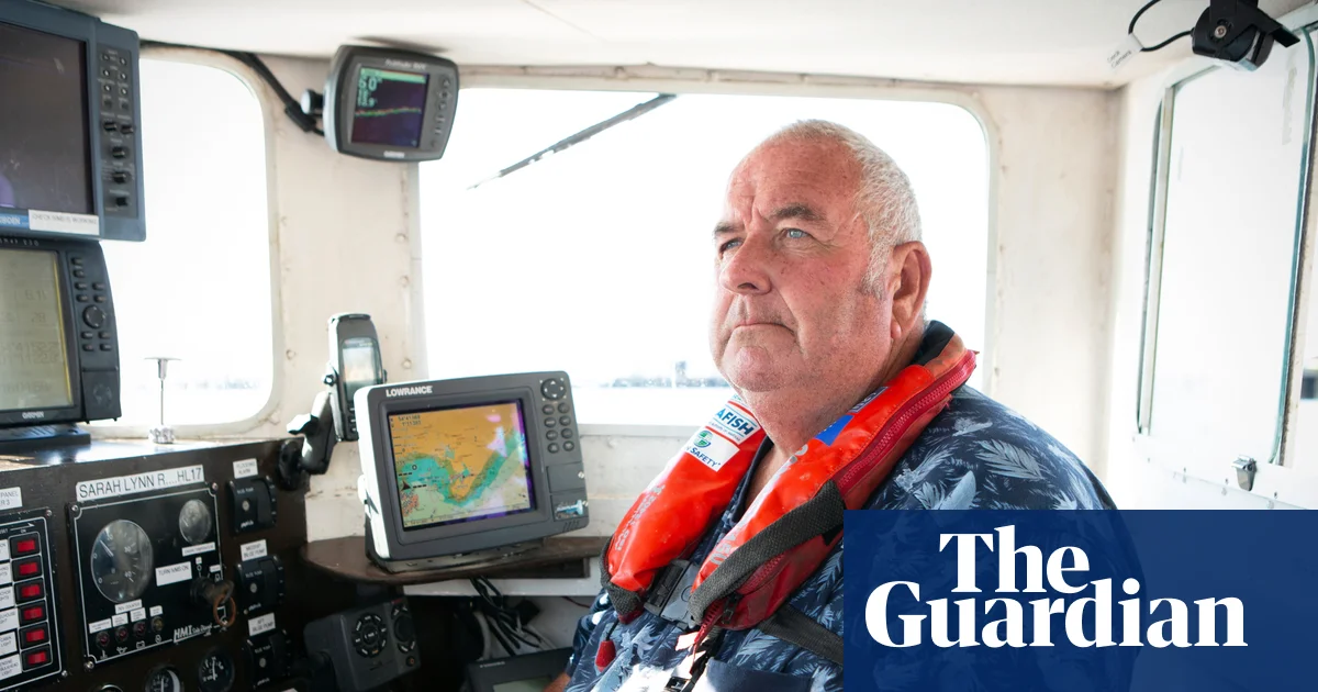 Veteran fisherman Stan Rennie looking out over the North Sea coast in Hartlepool.