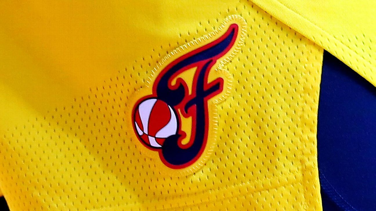 Kelly Krauskopf speaking at an Indiana Fever front office press conference.