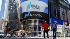 Financial stock market board displaying falling share prices in technology companies