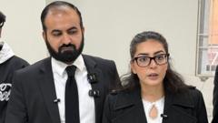 Pakistani human rights lawyer Imaan Mazari speaks with reporters outside a courthouse in Islamabad.