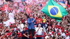 Luiz Inácio Lula da Silva waves a Brazilian flag at a campaign rally in São Paulo.