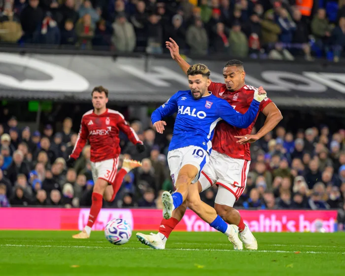 Julio Enciso celebrates scoring the equalizing goal for Ipswich Town against Nottingham Forest in the rain at Portman Road.