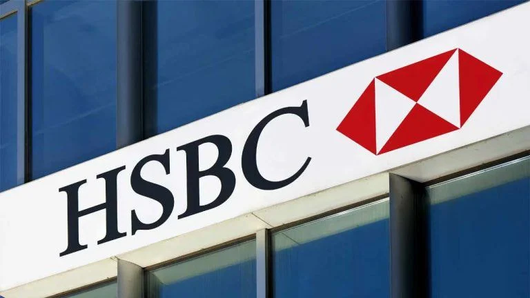 HSBC corporate branding displayed beside mobile phone payment interfaces and digital financial network graphics.