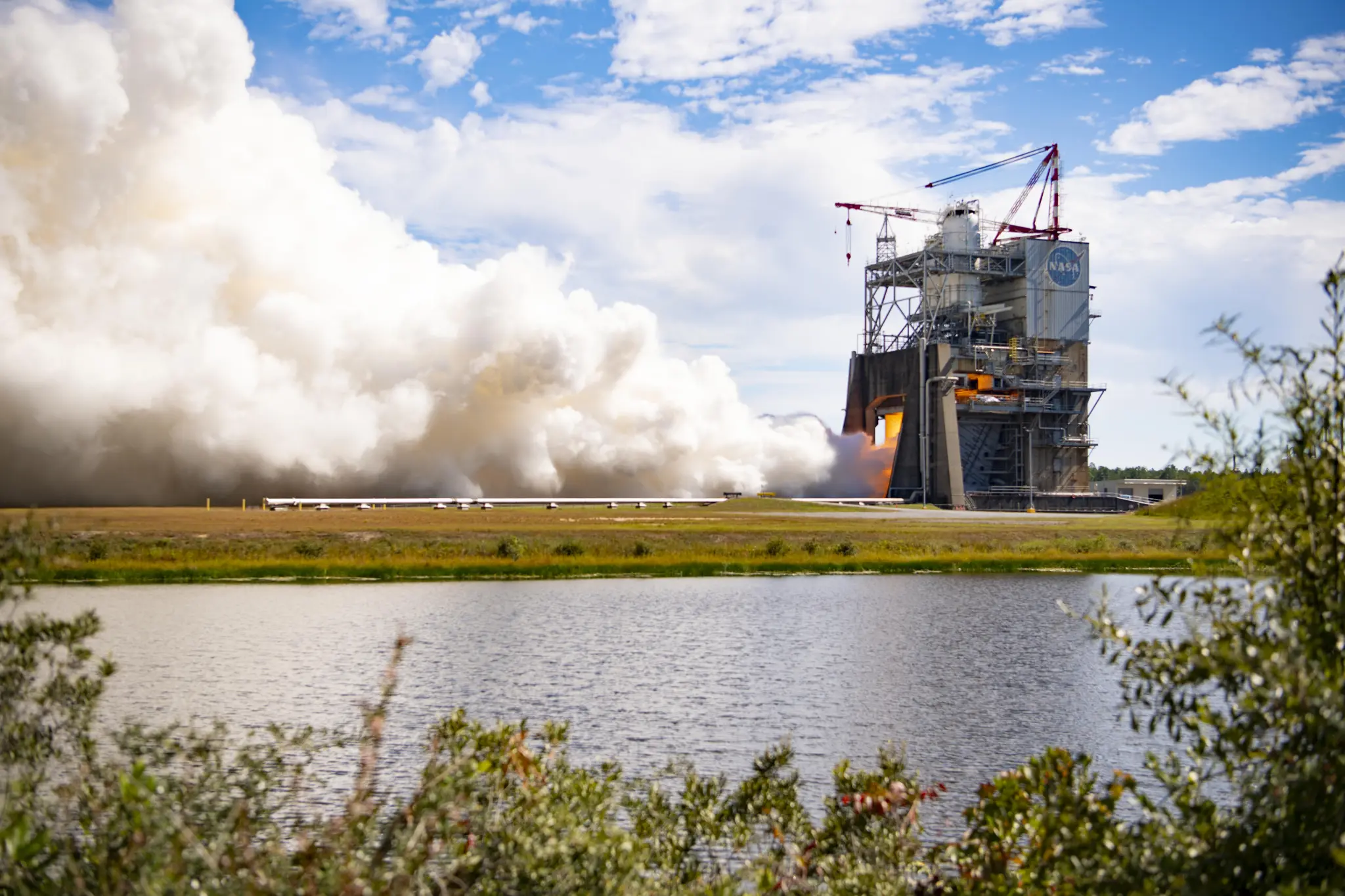Hot fire test of NASA RS-25 engine No. 10001 firing on the Fred Haise Test Stand at Stennis Space Center.