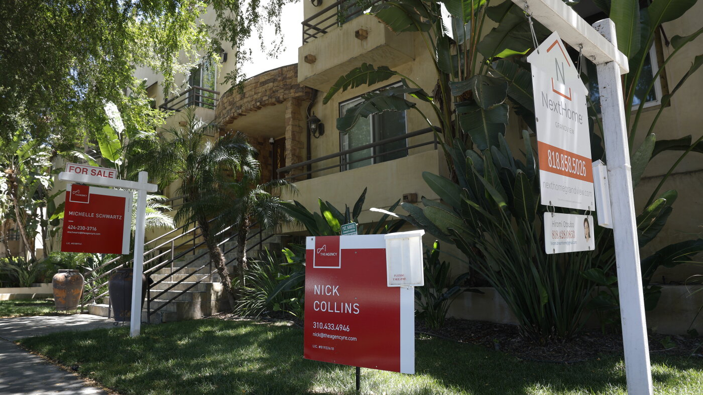 For-sale signs outside condominiums in Los Angeles.