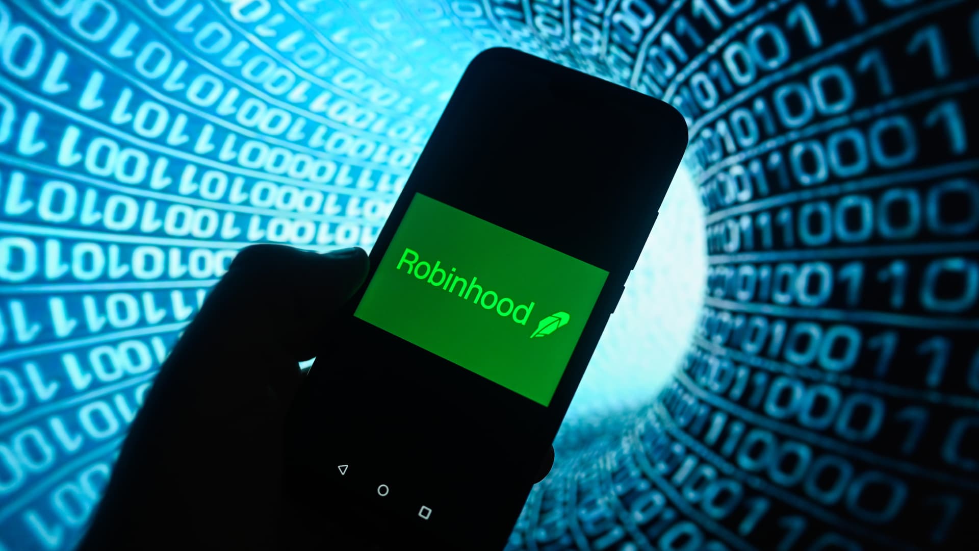 Robinhood Markets logo displayed on a smartphone screen with a stock chart in the background