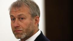 Russian billionaire Roman Abramovich in a dark suit attending an official event.