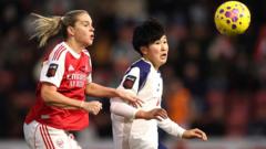 Tottenham and Arsenal players during a high-stakes football match