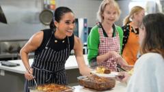 Meghan, Duchess of Sussex, smiling at a public event, confirmed as co-host of Junior MasterChef Australia 2027
