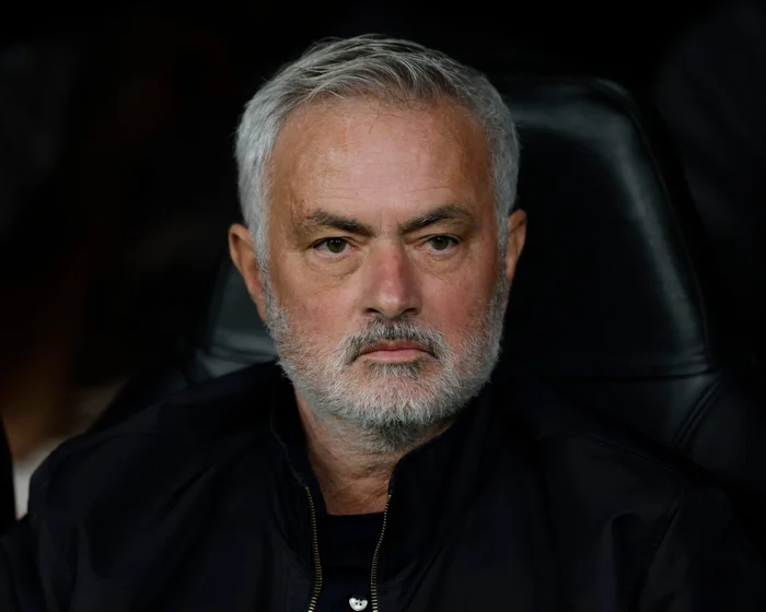 Real Madrid manager José Mourinho watching from the touchline during a match.