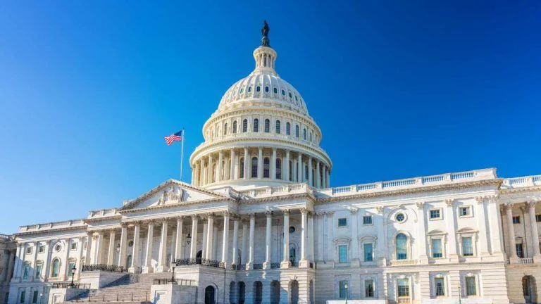 The United States Capitol dome under an overcast sky representing congressional oversight and regulatory scrutiny.