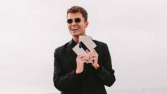 Singer Jamie Miller celebrating his chart-topping UK number one single Babydoll