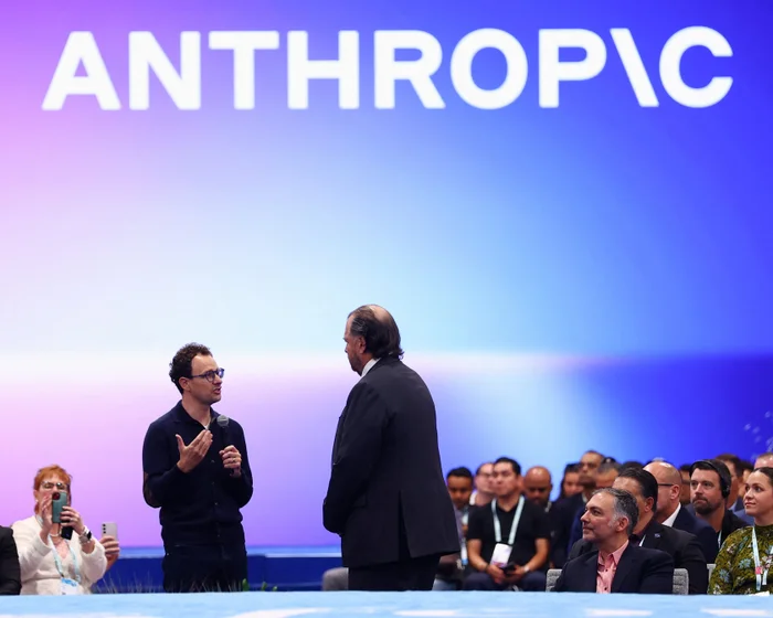 Anthropic headquarters with abstract digital representations of artificial intelligence agents and workforce data